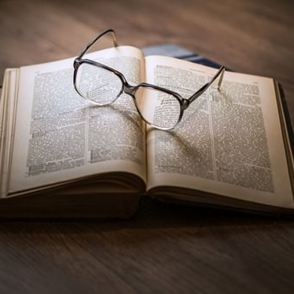 Glasses and book